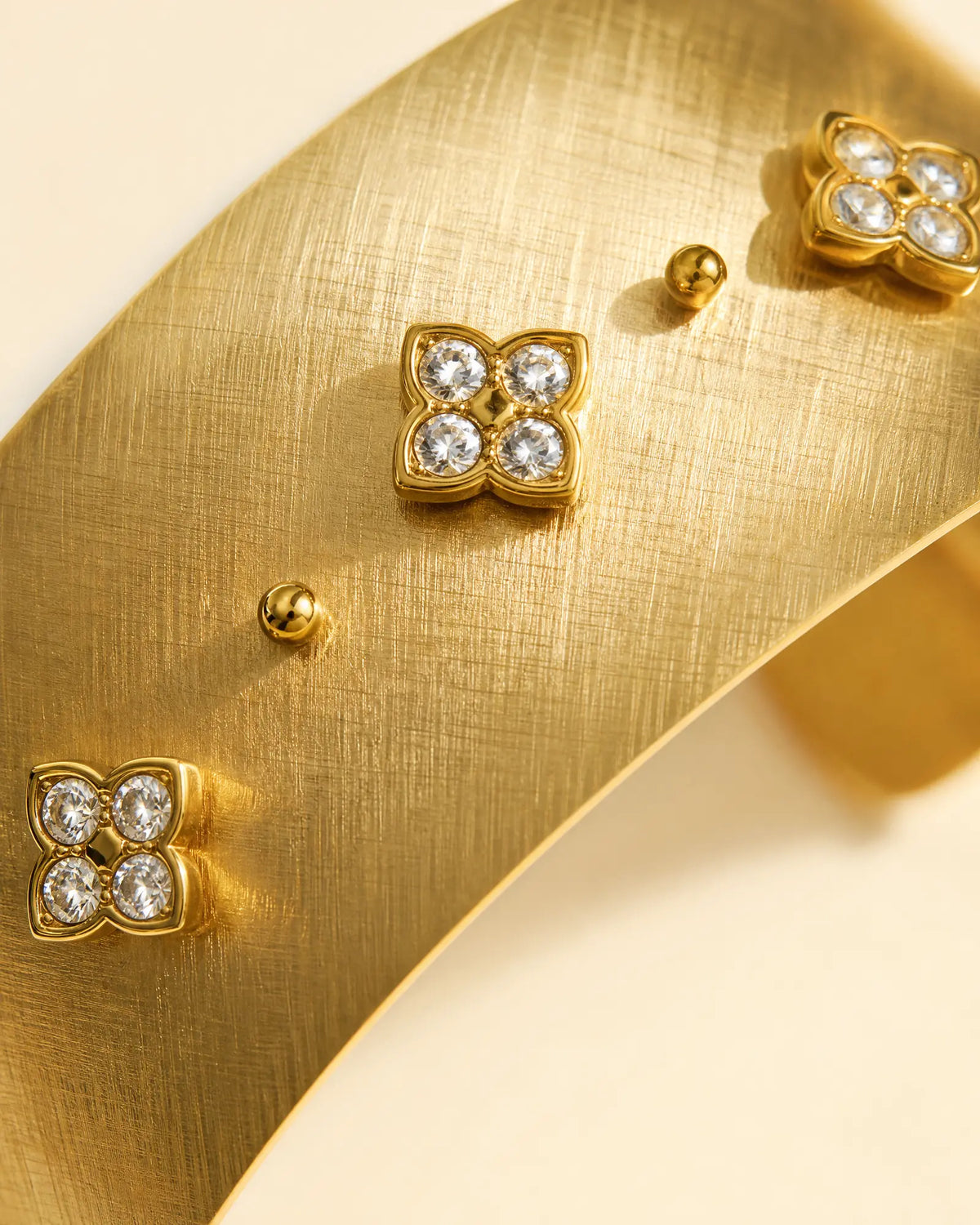 Quatrefoil Zircon Gold Open Bracelet
