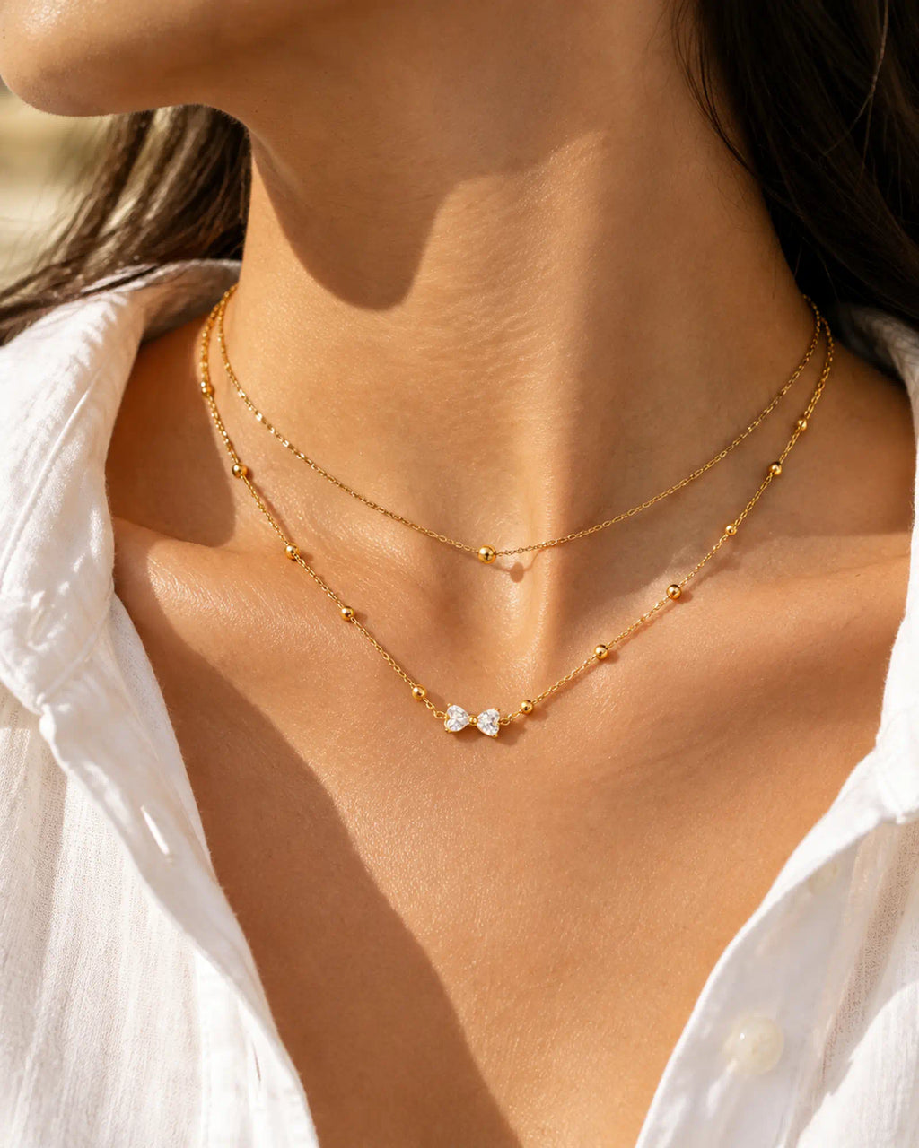 Wearlumi Beaded Bow Pendant Necklace styled in layered necklace look