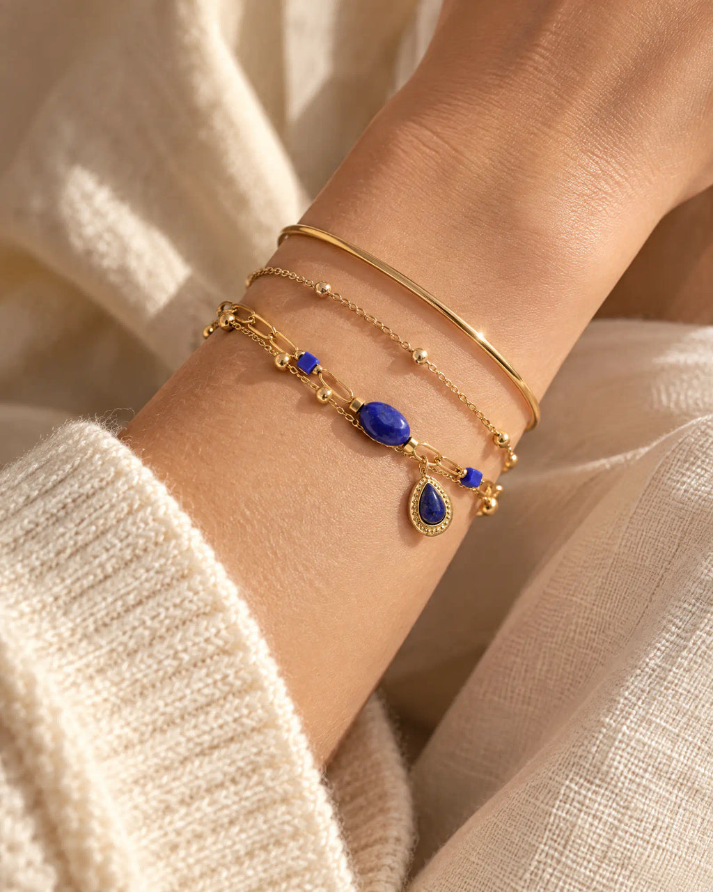 Midnight Teardrop Layered Bracelet styled in a wrist stack with cuff