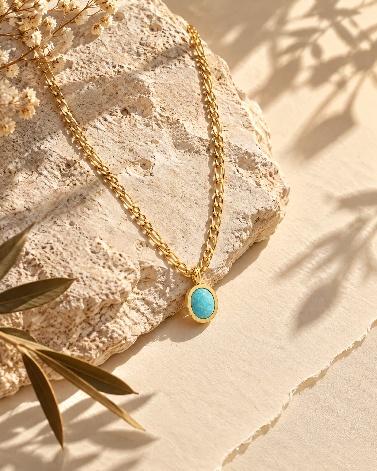 Shoreline Oval Figaro Pendant Necklace on limestone stone scene