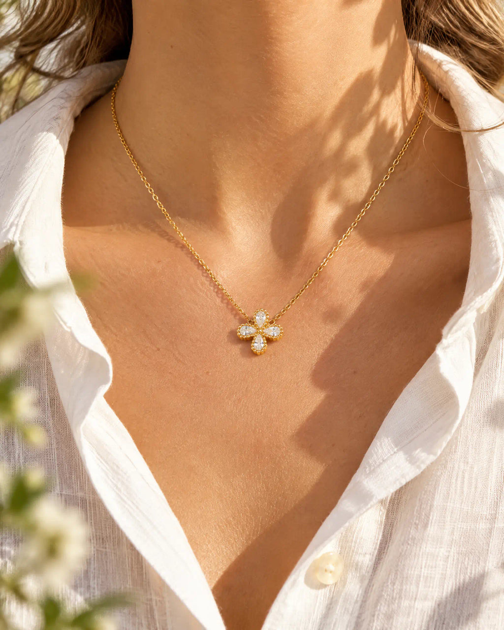 Wearlumi Four Petal Beaded Clover Pendant Necklace worn close-up on neck