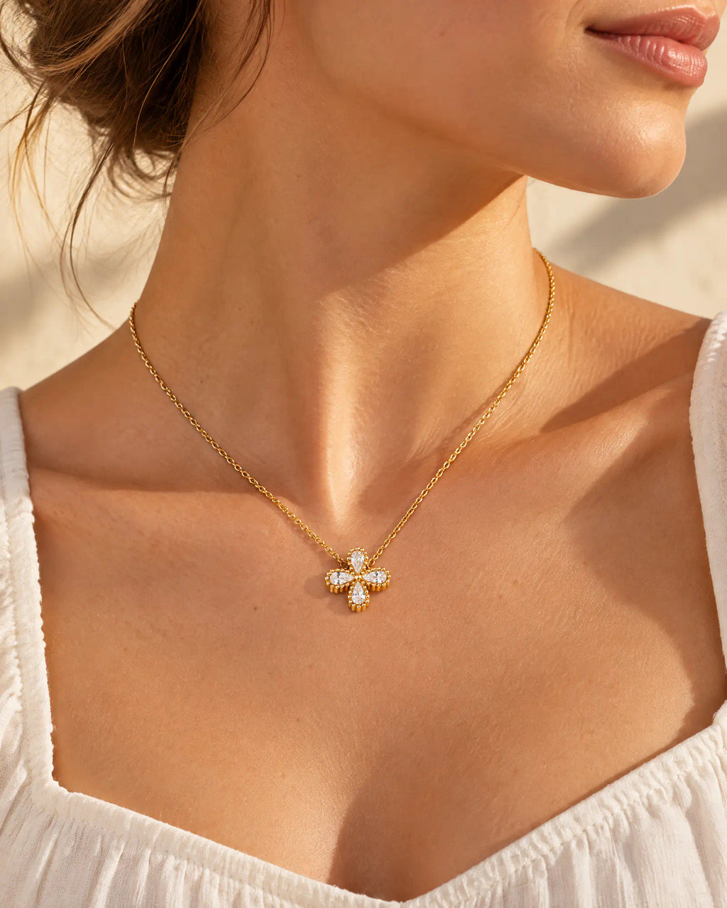 Wearlumi Four Petal Beaded Clover Pendant Necklace worn three-quarter view