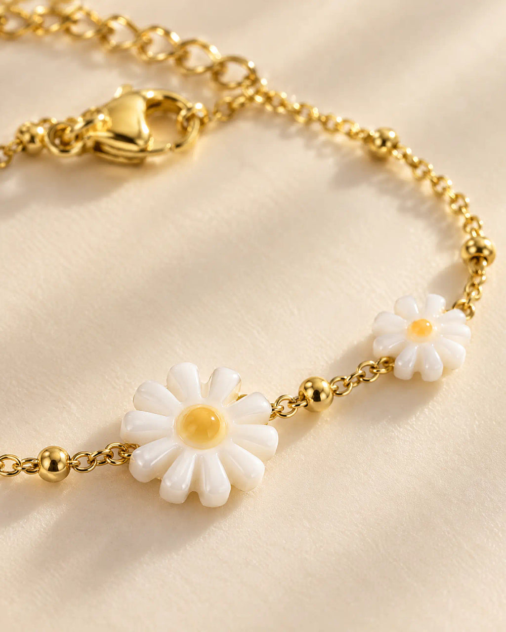 Macro close-up detail of carved daisy blossoms and center accents