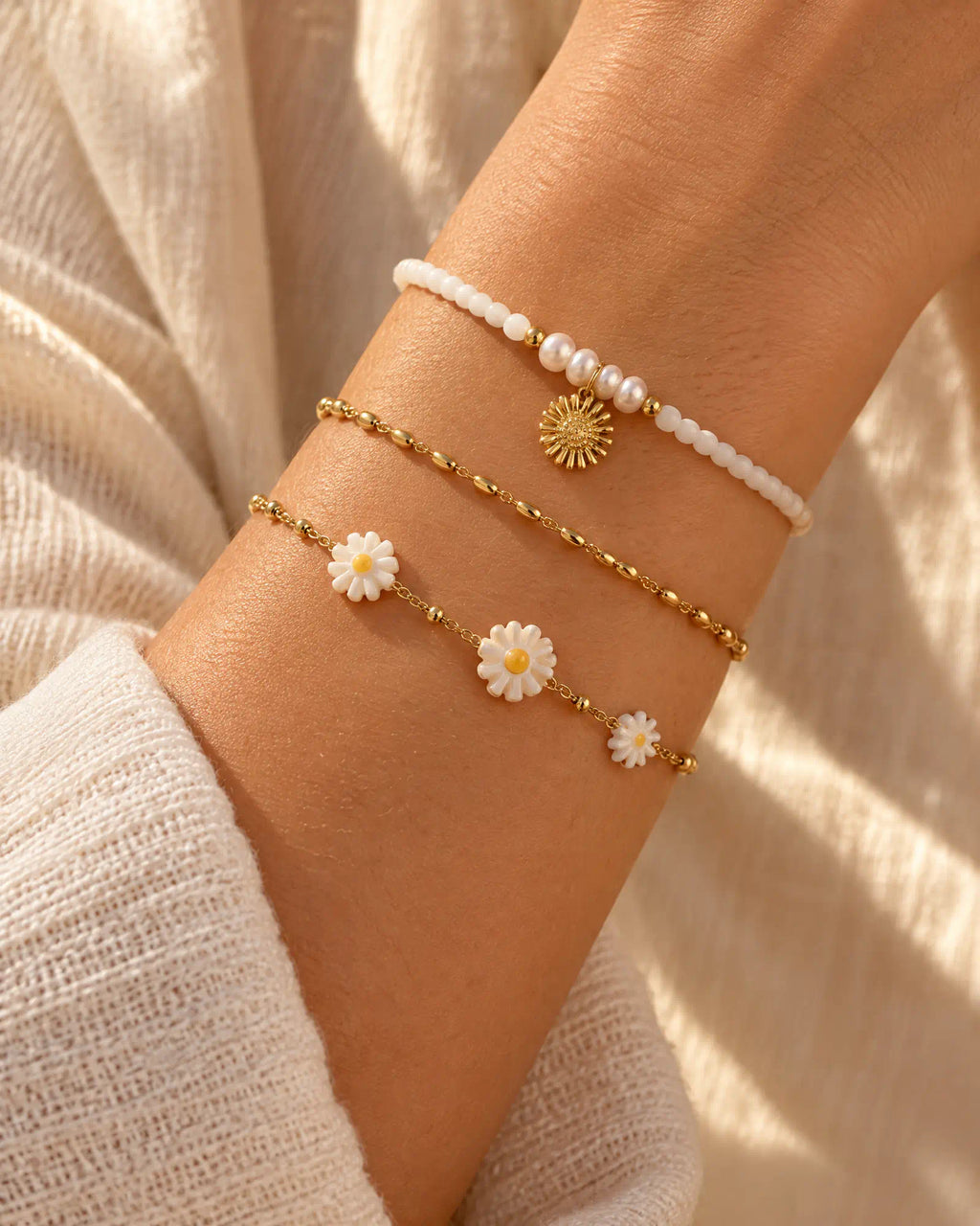 Sunlit Daisy Station Bracelet styled in a delicate wrist stack