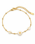 Sunlit Daisy Station Bracelet on white background showing floral stations and satellite chain