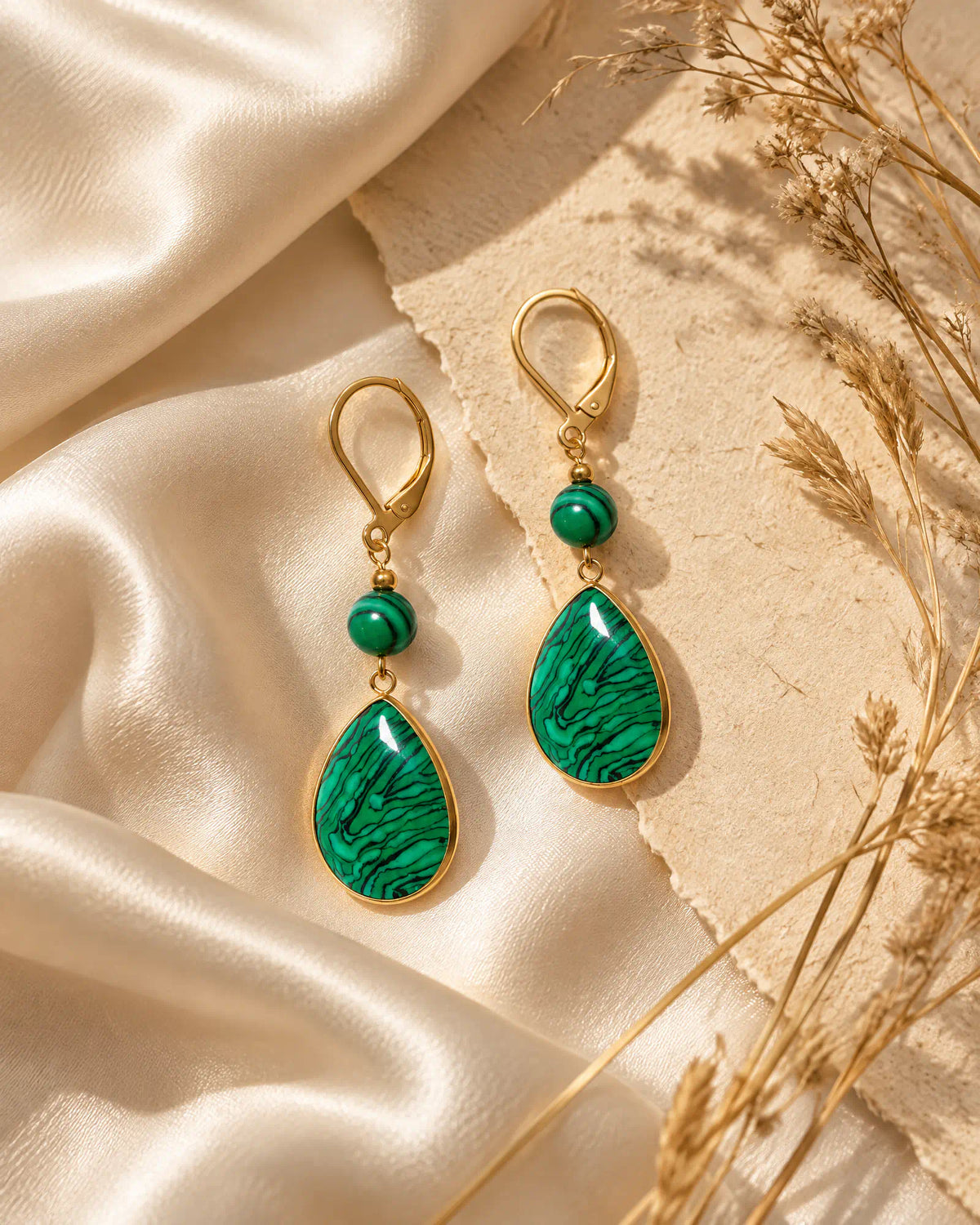 Verdant Teardrop Leverback Earrings on draped champagne silk