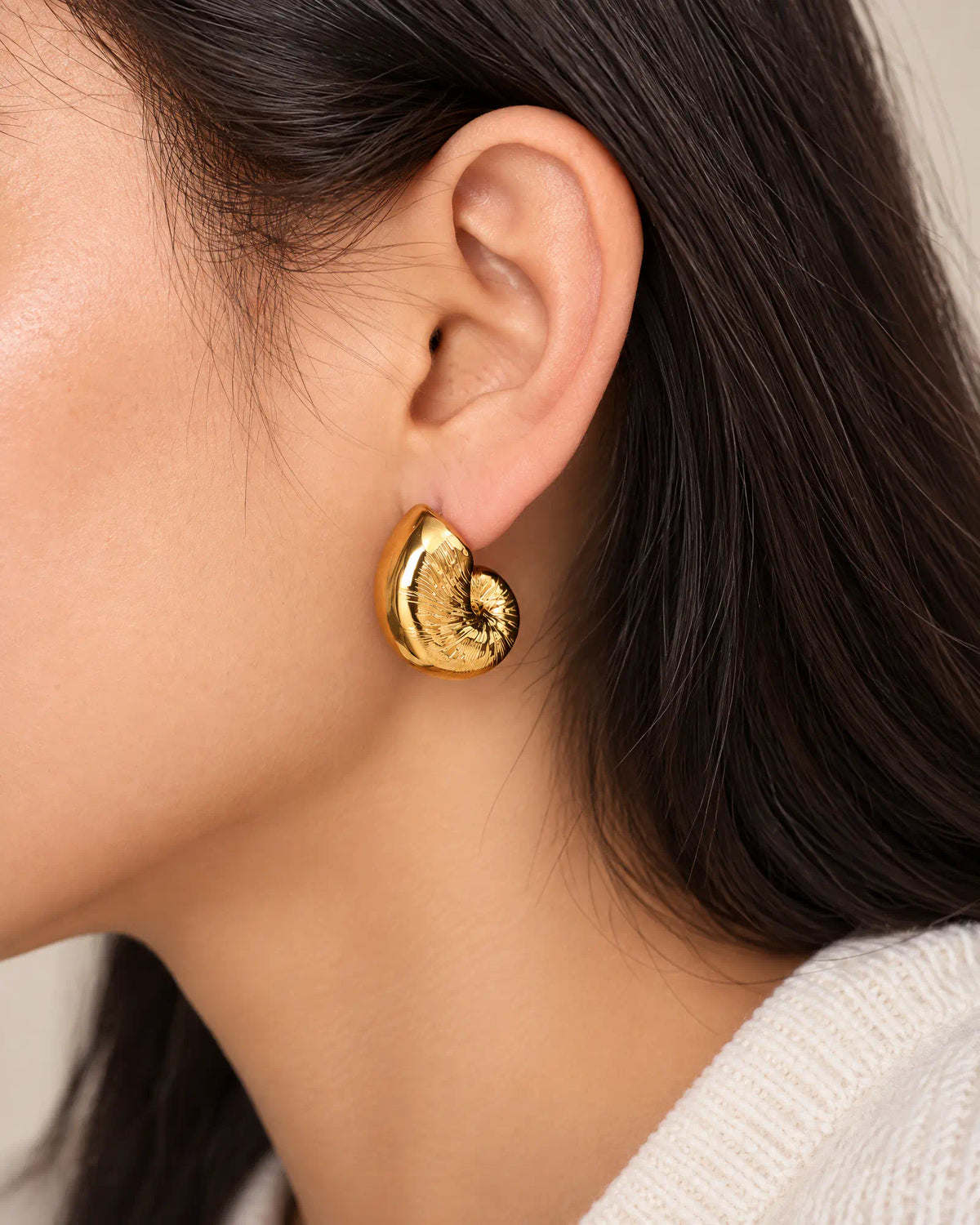 Coiled Nautilus Shell Stud worn profile on earlobe