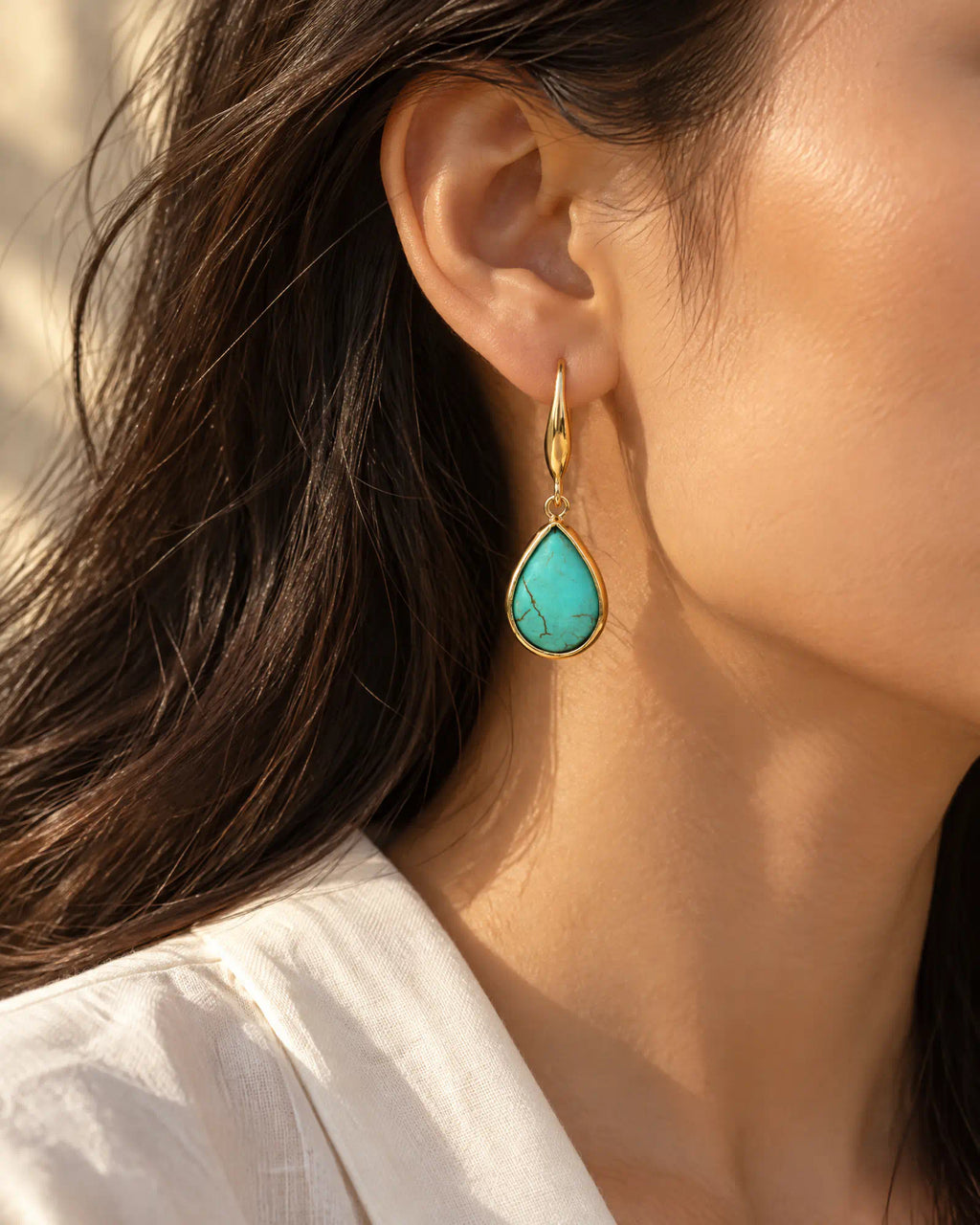 Coastal Teardrop Drop Earrings three-quarter ear worn view