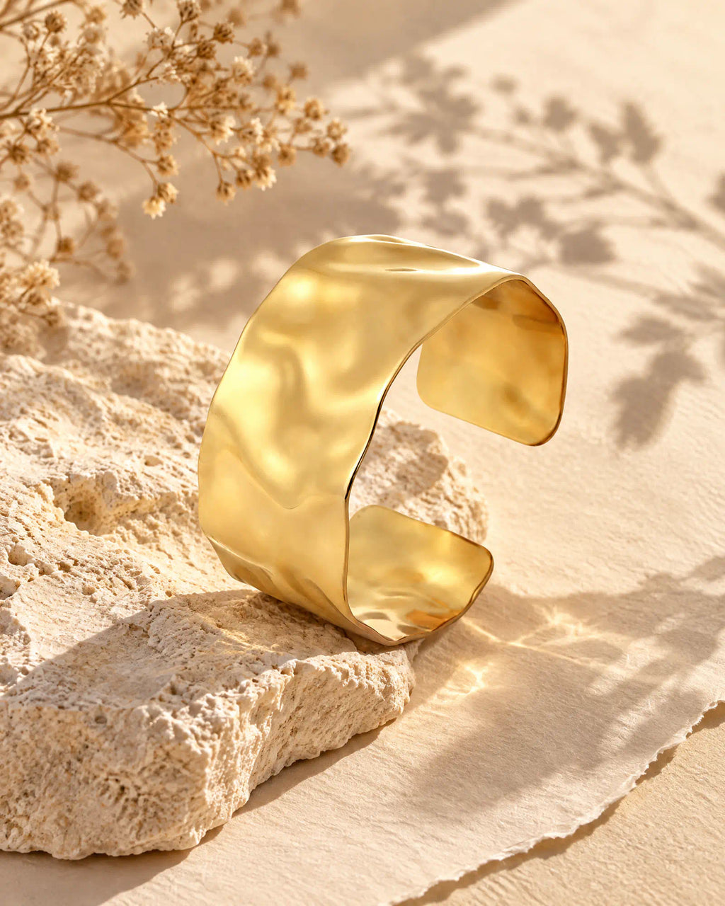 Shoreline Wave Open Cuff on limestone surface