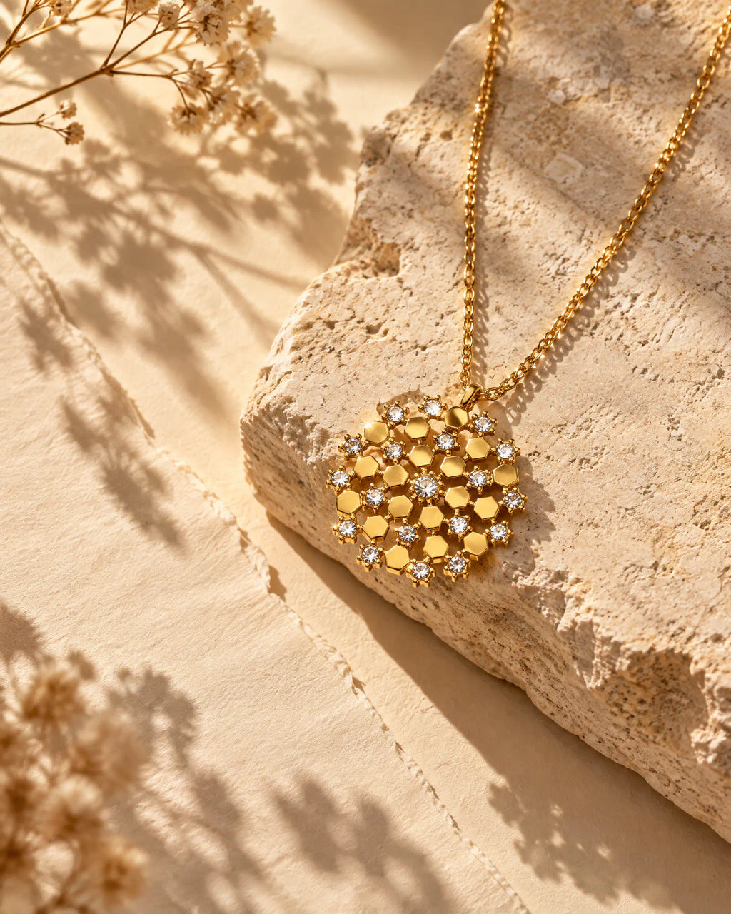 Wearlumi Honeycomb Mosaic Medallion Pendant Necklace on natural limestone surface