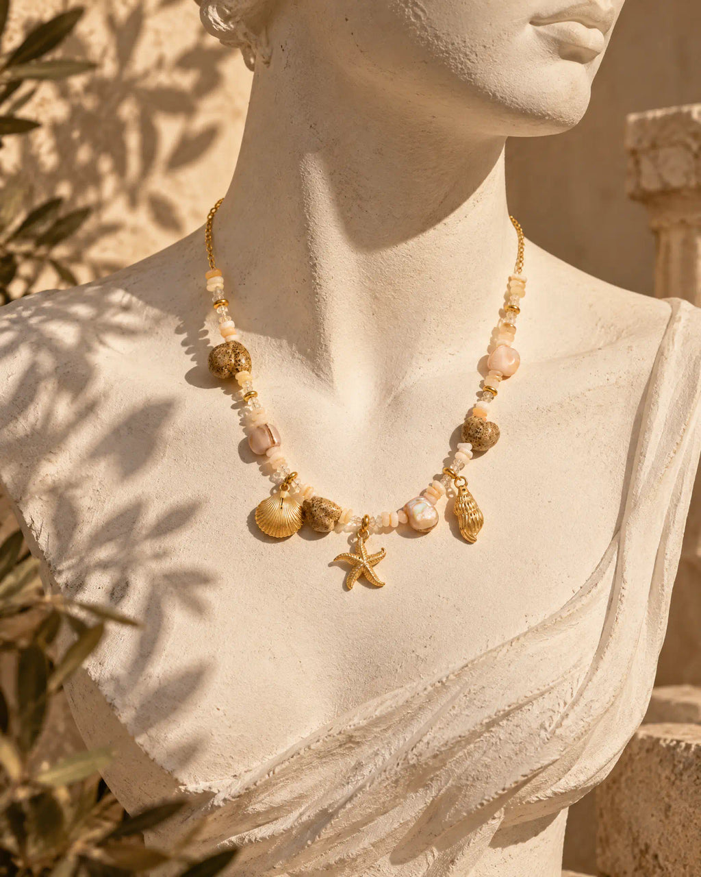 Shoreline Starfish Charm Necklace worn on model bust with open white shirt