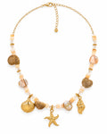 Shoreline Starfish Charm Necklace displayed on white background showing shell and starfish pendants