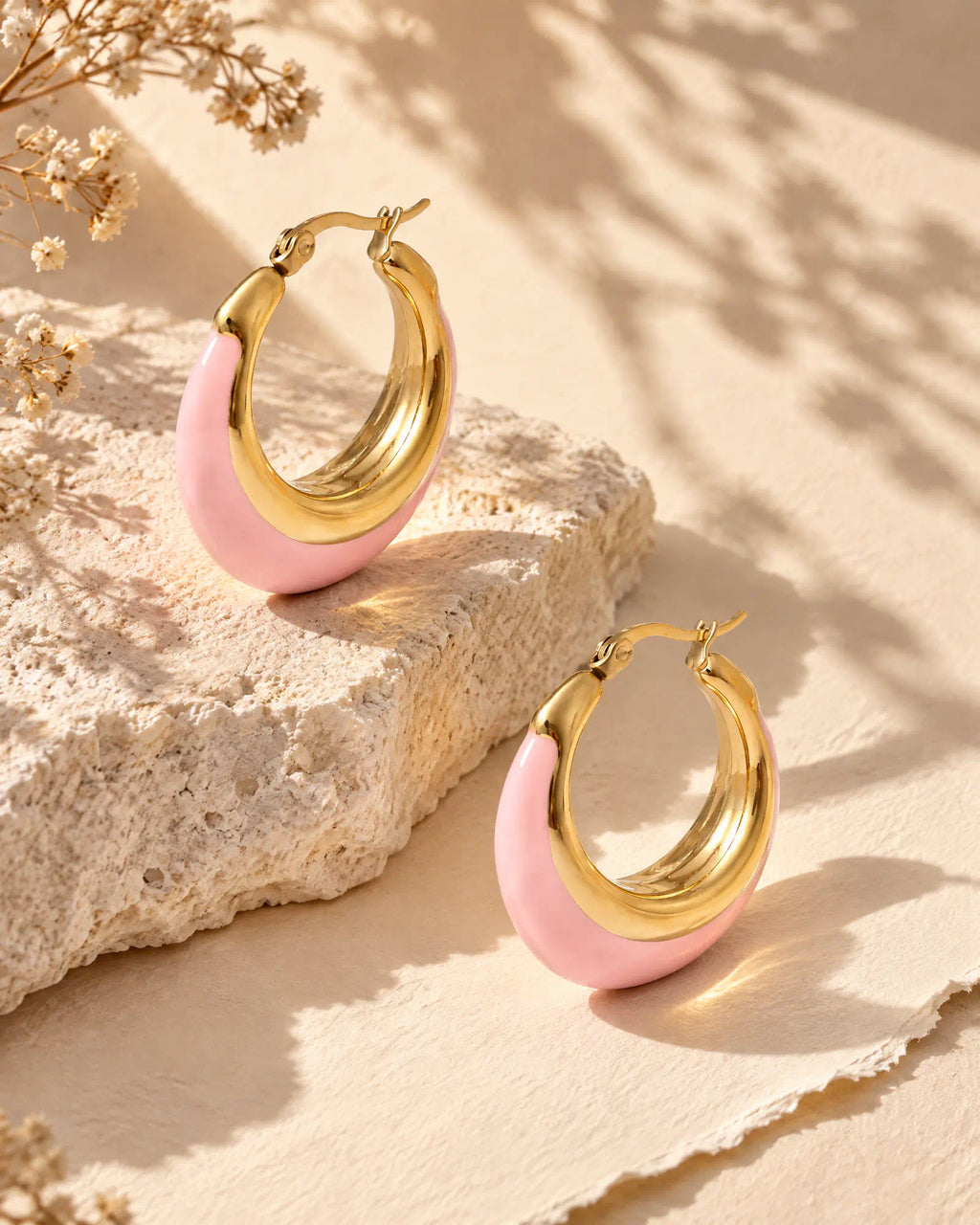 Blush Crescent Oval Hoops on limestone texture