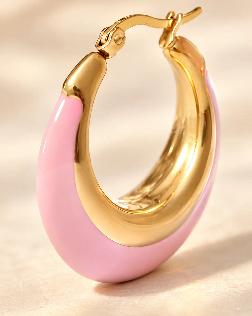 Blush Crescent Oval Hoops surface and clasp macro detail