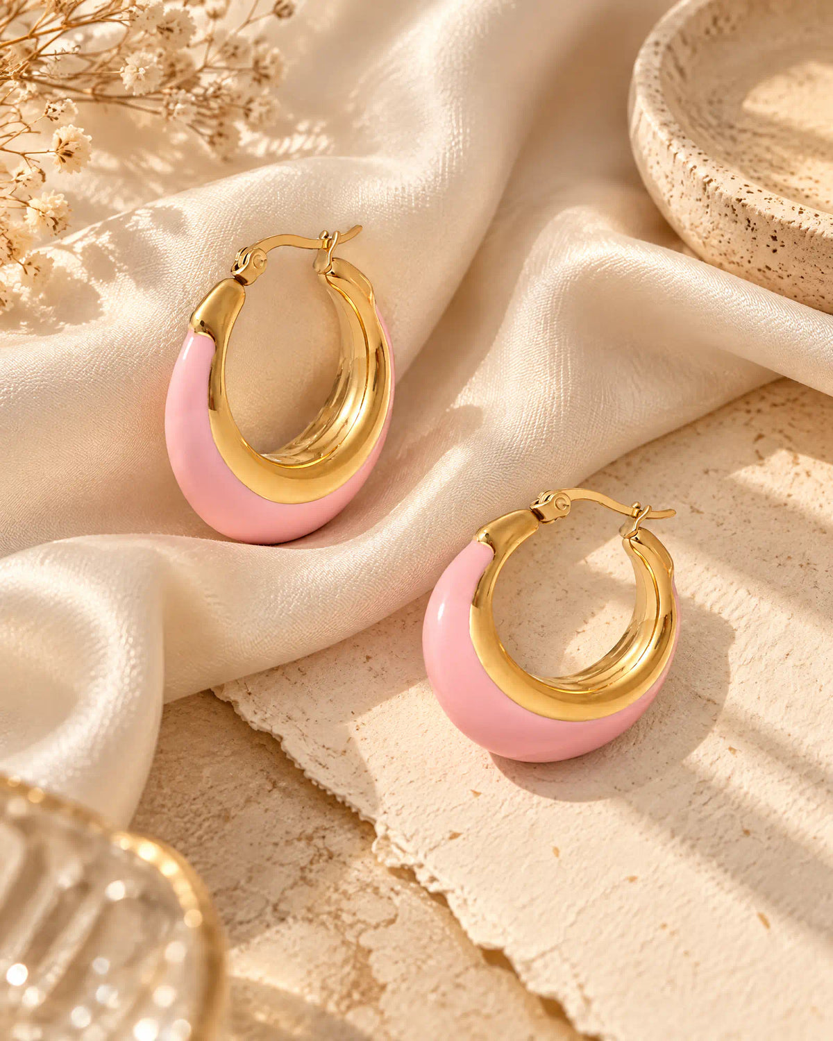 Blush Crescent Oval Hoops on draped silk