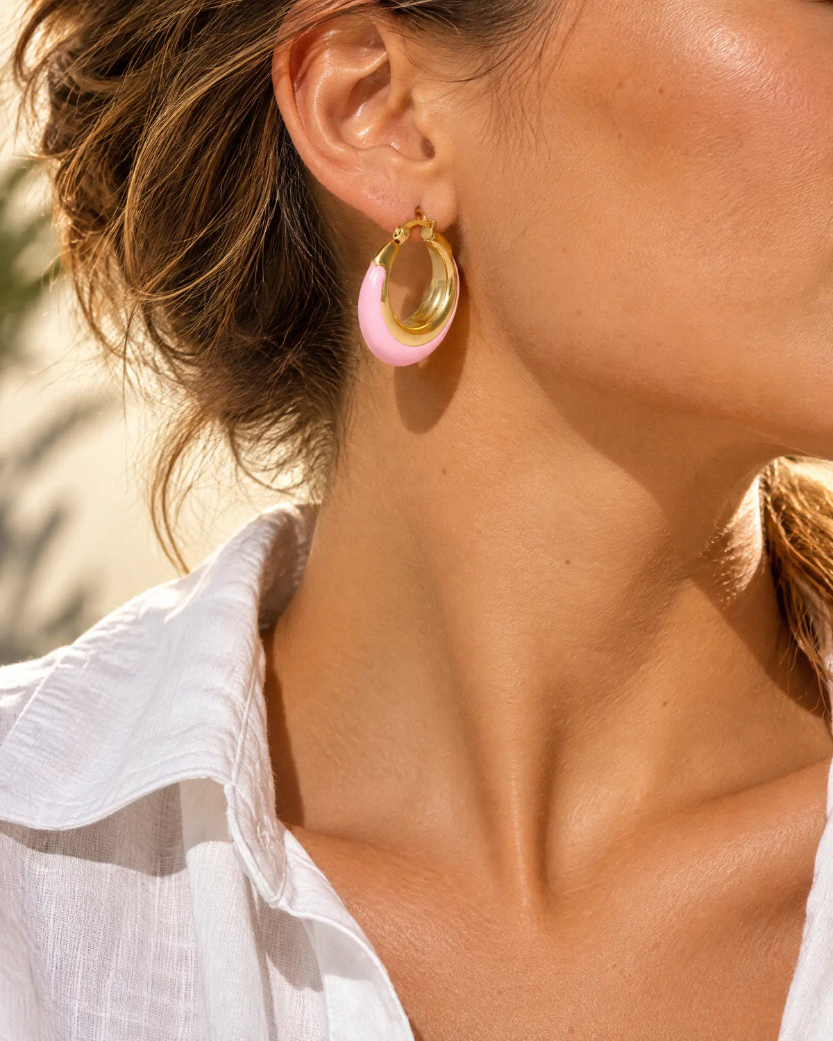 Blush Crescent Oval Hoops styled with summer outfit