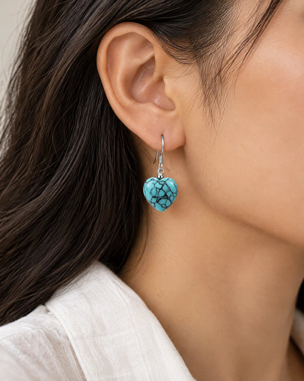 Cerulean Heart Wire Drops worn on ear