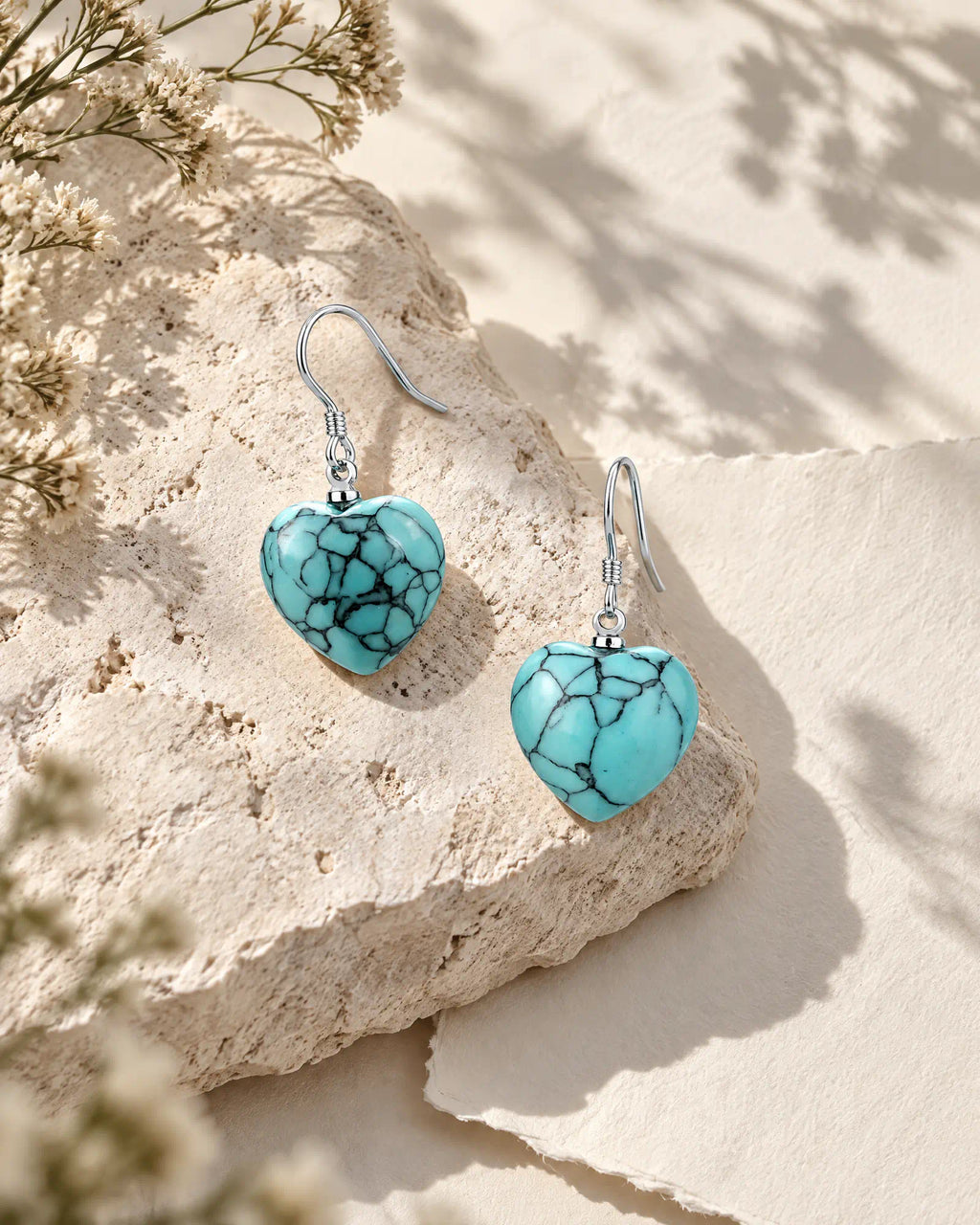 Cerulean Heart Wire Drops on limestone surface