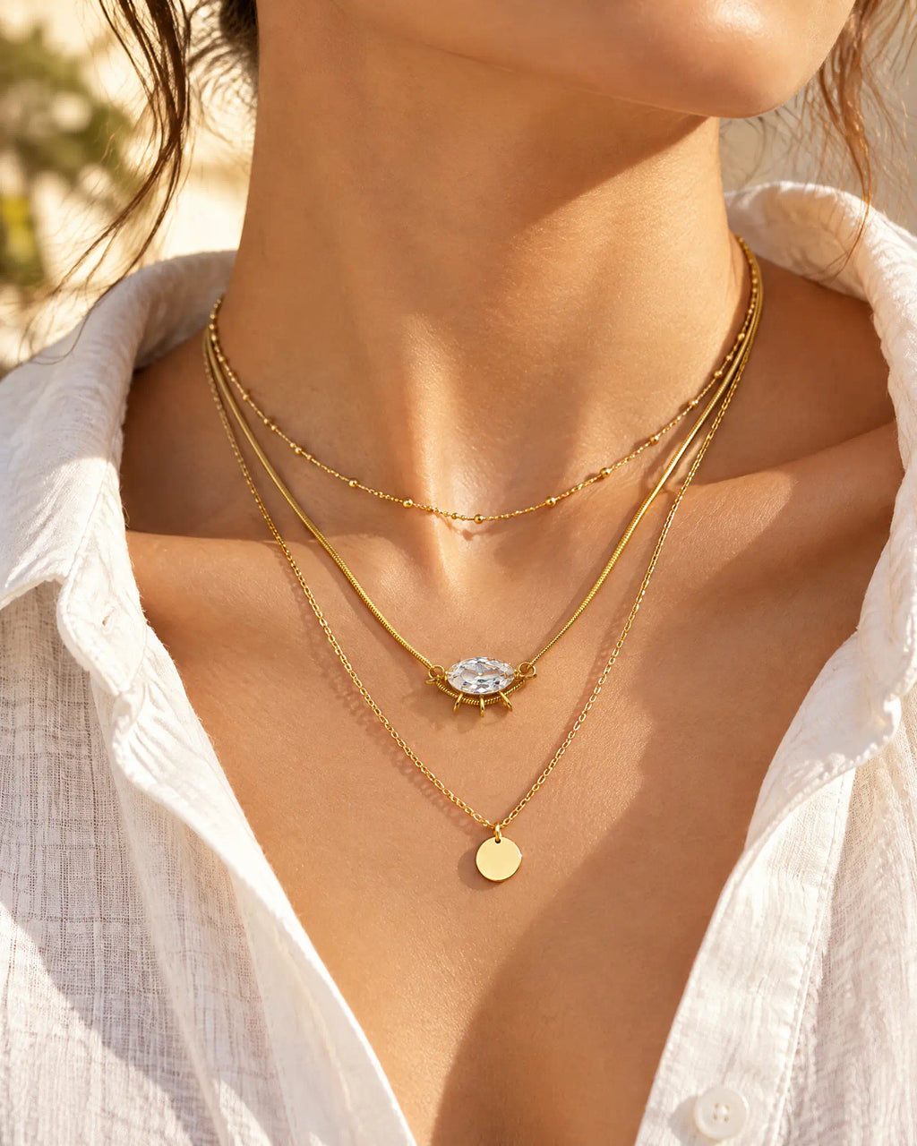 Wearlumi Sunburst Oval Ray Pendant Necklace layered with bead choker and disc necklace