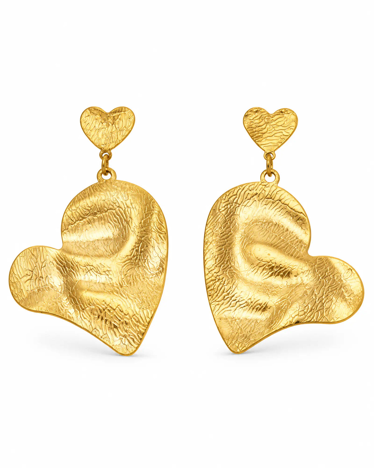Pair of rippled heart drop earrings on white background